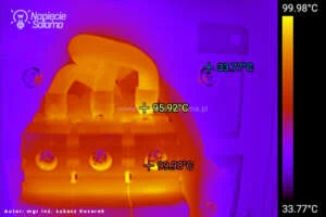 Termowizja przegrzanego zacisku aparatu elektrycznego wskazująca temperaturę prawie 100 stopni Celsjusza